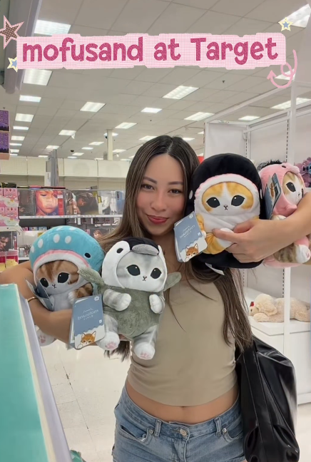 Jazwares/Mofusand at Target campaign. MomSelect Influencer holding Mofusand stuffed plushes in Target. 