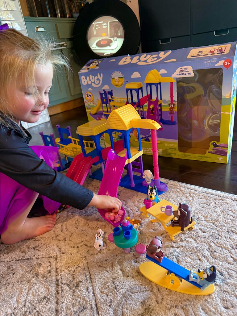 Moose Toys Bluey x Costco campaign. Daughter of MomSelect lnfluencer playing with exclusive Bluey playset.